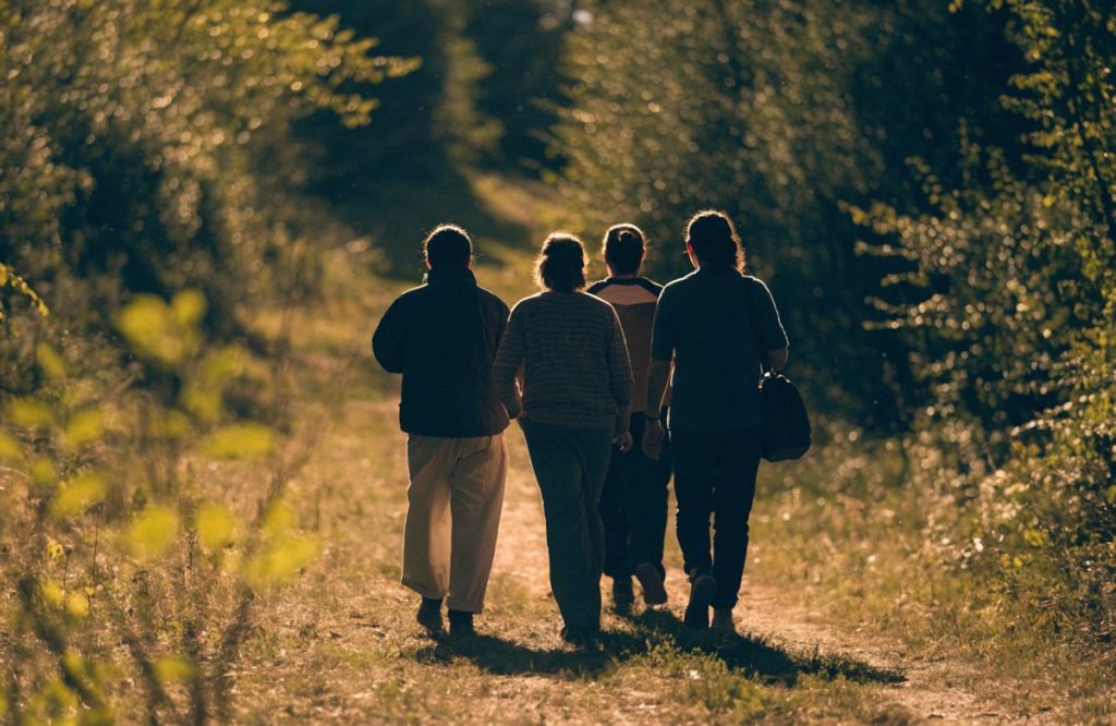 People in a supportive group recovery setting